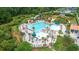 Expansive community pool area with slides, lounge chairs, and lush landscaping at 1720 Bowline Dr, Mount Pleasant, SC 29466