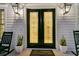 Charming entrance features decorative glass doors, classic lighting, and a welcoming 'Home Sweet Home' mat at 1720 Bowline Dr, Mount Pleasant, SC 29466