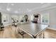 Spacious game room featuring ping pong, exercise equipment, and arcade games, perfect for entertaining guests at 1720 Bowline Dr, Mount Pleasant, SC 29466