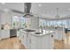 Bright kitchen features white cabinets, a large island, and stainless steel appliances at 1720 Bowline Dr, Mount Pleasant, SC 29466