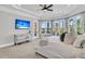 Elegant primary suite showcasing large windows, a private patio, and comfortable seating at 1720 Bowline Dr, Mount Pleasant, SC 29466