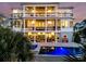 Multi-story home featuring a private pool and patio area perfect for outdoor entertaining at 1720 Bowline Dr, Mount Pleasant, SC 29466