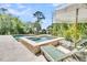 Luxury pool and spa area with poolside loungers, perfect for relaxation and outdoor enjoyment at 1720 Bowline Dr, Mount Pleasant, SC 29466