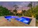 Inviting pool and spa area with elegant stone accents and lush landscaping at 1720 Bowline Dr, Mount Pleasant, SC 29466