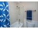 Bathroom with tile shower and toilet with blue towel at 2016 Wild Flower Ln, Charleston, SC 29414