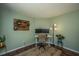 Bright home office featuring dual monitors, stylish lamp, cozy chair, and ample room for a productive workspace at 2016 Wild Flower Ln, Charleston, SC 29414