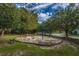 A colorful playground with swings and a seesaw offers fun for all at 2016 Wild Flower Ln, Charleston, SC 29414