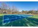 Well-lit tennis court provides a great space for recreation and exercise at 2016 Wild Flower Ln, Charleston, SC 29414