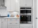 Gourmet kitchen featuring modern appliances, stylish cabinets, and ample counter space at 2020 Parish House Cir, Johns Island, SC 29455