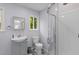 Clean, simple bathroom with a standup shower, gray vanity, and natural light at 2045 Vestry Dr, Charleston, SC 29414