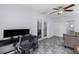 Flexible bonus room with tile flooring, ceiling fan, and access to an adjacent living area at 2045 Vestry Dr, Charleston, SC 29414