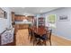 Dining room with hardwood floors, wood table with seating for six, and display cabinet at 2045 Vestry Dr, Charleston, SC 29414