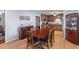 Dining room with hardwood floors, wood table with seating for six, and display cabinet at 2045 Vestry Dr, Charleston, SC 29414