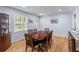 Dining room featuring hardwood floors, wood table with seating for six, and display cabinet at 2045 Vestry Dr, Charleston, SC 29414