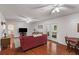 Inviting living room with hardwood floors, ceiling fans, and a cozy atmosphere at 2045 Vestry Dr, Charleston, SC 29414