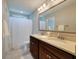 Bathroom with a double sink vanity, large mirror, and shower with curtain at 214 Center Hill Ct, Summerville, SC 29485