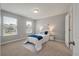 Comfortable bedroom with neutral walls, a window for natural light, and soft blue accents at 214 Center Hill Ct, Summerville, SC 29485