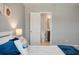 Bedroom with neutral walls and ensuite bathroom access and baseball themed decor at 214 Center Hill Ct, Summerville, SC 29485
