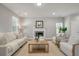 Spacious living room with wood floors, a decorative fireplace, and neutral paint at 214 Center Hill Ct, Summerville, SC 29485