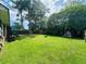 Spacious backyard featuring a storage shed and ample green space at 214 Four Iron Dr, Summerville, SC 29483