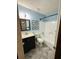 The blue bathroom has a granite topped vanity, toilet and a shower-tub combo at 214 Four Iron Dr, Summerville, SC 29483