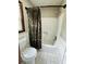 This bathroom features a white tiled floor and a shower-tub combo with camouflage shower curtain at 214 Four Iron Dr, Summerville, SC 29483