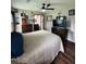 Bedroom featuring laminate flooring, neutral paint, ceiling fan, and decor at 214 Four Iron Dr, Summerville, SC 29483