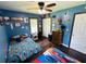 Bedroom with hardwood floors, ceiling fan, one window, closet and two twin beds at 214 Four Iron Dr, Summerville, SC 29483