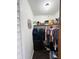 Walk-in closet with upper shelf storage for organization at 214 Four Iron Dr, Summerville, SC 29483