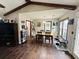 View of the dining room with hardwood floors and a wooden table at 214 Four Iron Dr, Summerville, SC 29483