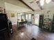 View of the dining room with hardwood floors and a wooden table at 214 Four Iron Dr, Summerville, SC 29483