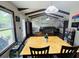 View of the dining room with hardwood floors and a wooden table at 214 Four Iron Dr, Summerville, SC 29483