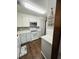Updated kitchen features white cabinets, stainless steel appliances, and butcher block countertops at 214 Four Iron Dr, Summerville, SC 29483