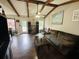 The living room has hardwood floors and a ceiling fan at 214 Four Iron Dr, Summerville, SC 29483