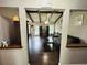 Open living room with hardwood floors and wooden beams at 214 Four Iron Dr, Summerville, SC 29483