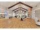 Wide open community clubhouse with high ceilings, fireplace, and cozy seating areas at 220 Garden Gate Way, Summerville, SC 29486