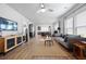 Inviting living room with hardwood floors, plenty of natural light, and an open layout great for entertaining at 220 Garden Gate Way, Summerville, SC 29486