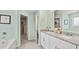 Elegant bathroom features granite countertops, double sinks, and a separate tub for a spa-like experience at 225 Wild Strawberry Ln, Moncks Corner, SC 29461
