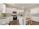 Bright kitchen features granite countertops, stainless steel appliances, and a central island with seating at 225 Wild Strawberry Ln, Moncks Corner, SC 29461