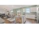 Modern kitchen with granite countertops, a kitchen island with seating, and stainless steel appliances at 225 Wild Strawberry Ln, Moncks Corner, SC 29461