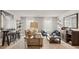 Spacious living room featuring comfortable seating, stylish decor, and ample natural light for a welcoming atmosphere at 225 Wild Strawberry Ln, Moncks Corner, SC 29461