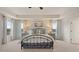 Spacious main bedroom with plush carpet, calming colors, and bedside tables with lamps for soft lighting at 225 Wild Strawberry Ln, Moncks Corner, SC 29461
