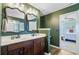 Bathroom offers a double sink vanity and an entrance to an en-suite bathroom at 230 Sweet Alyssum Dr, Ladson, SC 29456