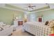 Comfortable bedroom features ample storage space with coordinating dressers and en-suite bathroom at 230 Sweet Alyssum Dr, Ladson, SC 29456