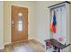 Welcoming foyer with wood flooring, coat rack, and ample space for organizing shoes and outerwear at 230 Sweet Alyssum Dr, Ladson, SC 29456
