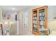 A bright hallway with built-in bookcase and lots of natural light at 230 Sweet Alyssum Dr, Ladson, SC 29456