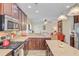 Beautiful kitchen featuring granite countertops, stainless appliances, and dark cabinetry at 230 Sweet Alyssum Dr, Ladson, SC 29456