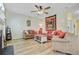 Spacious living room offering comfortable seating, a ceiling fan, and stylish decor at 230 Sweet Alyssum Dr, Ladson, SC 29456