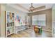 Bright playroom with wood floors, study space, shelving, and plenty of natural light at 230 Sweet Alyssum Dr, Ladson, SC 29456