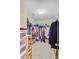 Walk-in closet offers ample storage space with custom shelving and storage options at 230 Sweet Alyssum Dr, Ladson, SC 29456